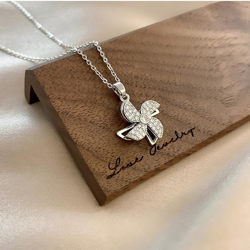 Rotatable Windmill Pendant Necklace for Women Geometric Titanium Steel Plated Locket Chain with Bow Detail Summer Lightweight Fashion Accessory