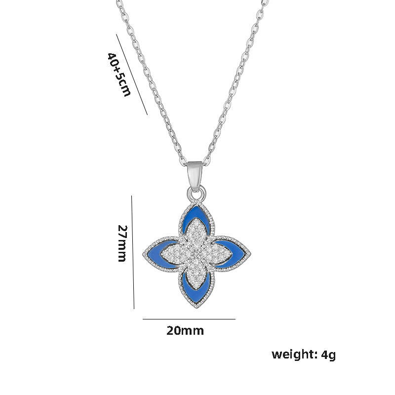 Collar con colgante minimalista de trébol de cuatro hojas para mujer en acero de titanio con incrustaciones de pedrería y acabado pulido en cadena ondulada