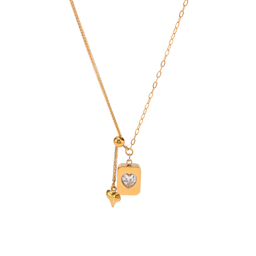 Collana con Pendente a Cuore Minimalista in Acciaio al Titanio con Intarsio in Zirconia Cubica e Placcatura in Oro 18K su Catena O per Donna