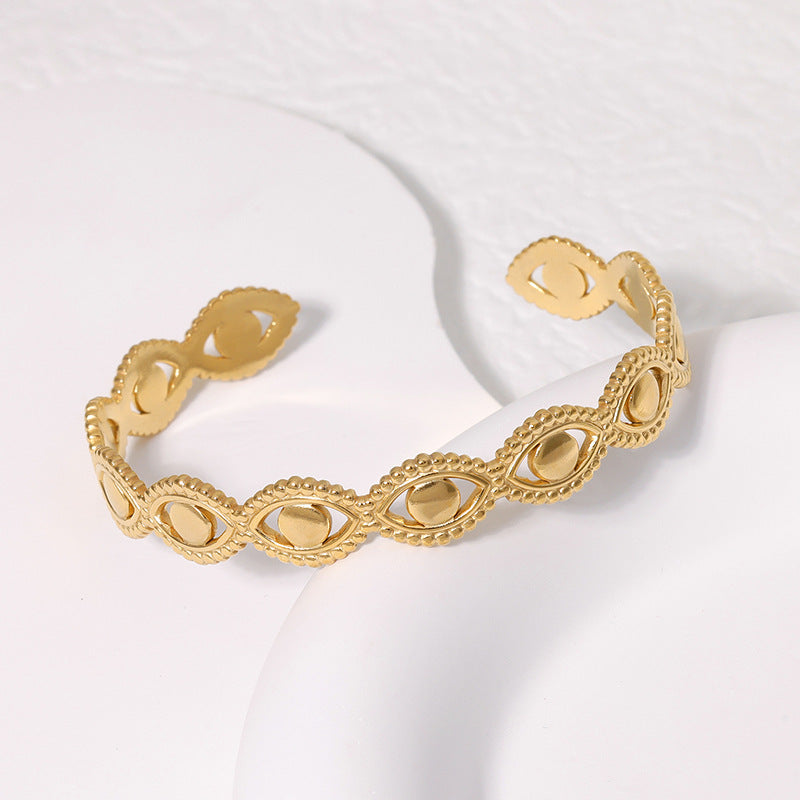 Bracciale in acciaio al titanio con design a occhio per donne, bracciale aperto in acciaio inossidabile con placcatura PVD