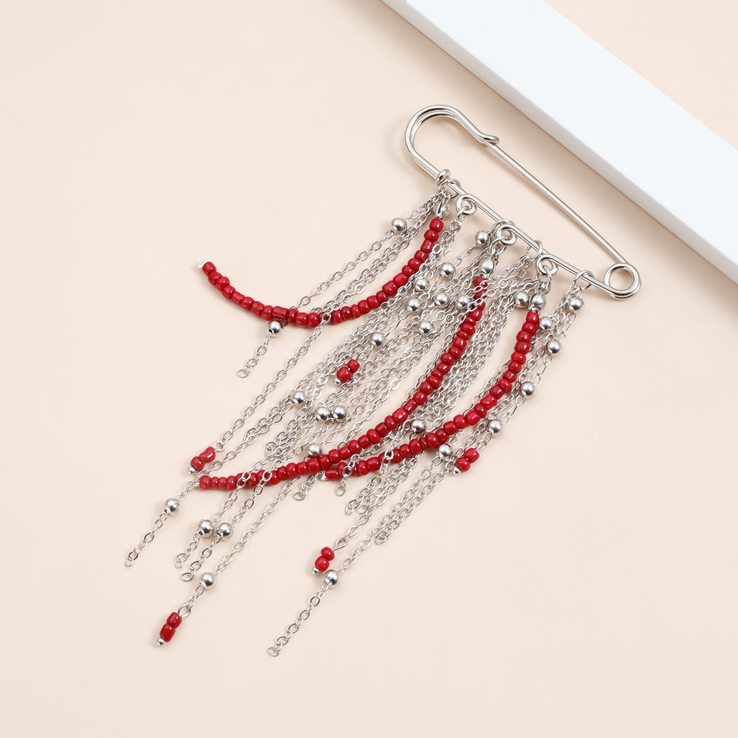 Vintage Geometric Alloy Plated Brooch with Red Bead Tassel and Multi-Chain Design