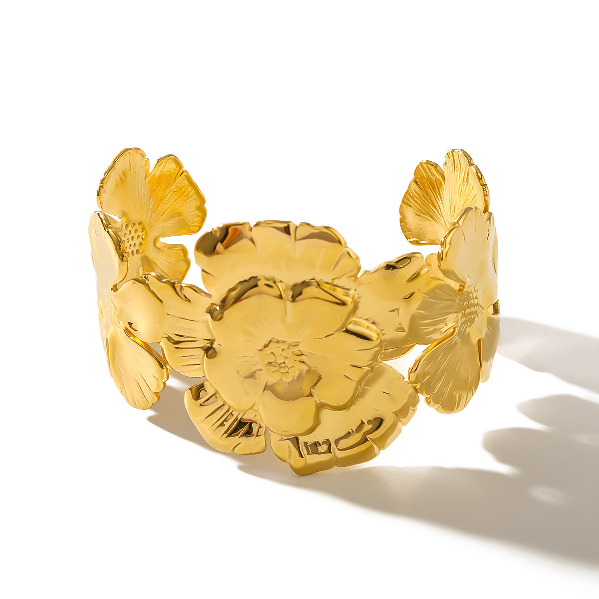 Bracciale rigido aperto da donna in acciaio al titanio a forma di fiore con placcatura in oro 18 carati, lucidissimo e scintillante