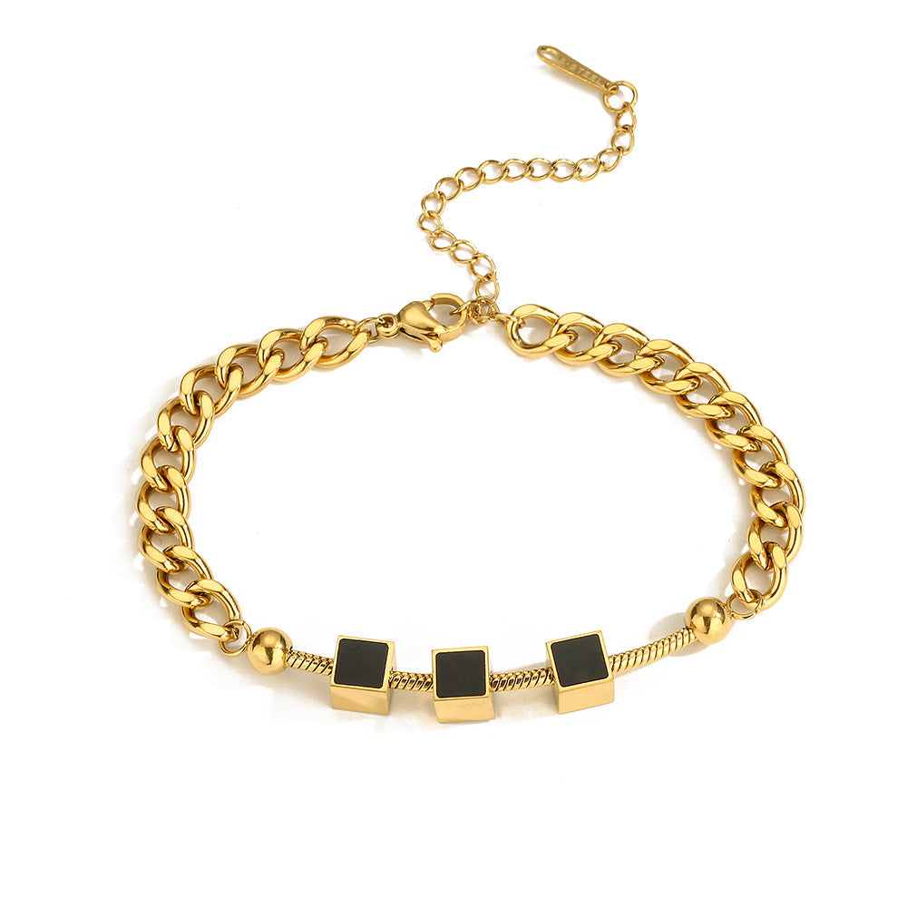 Bracciale da donna in acciaio al titanio con geometria minimalista, finitura placcata e design a catena ispirato alle conchiglie