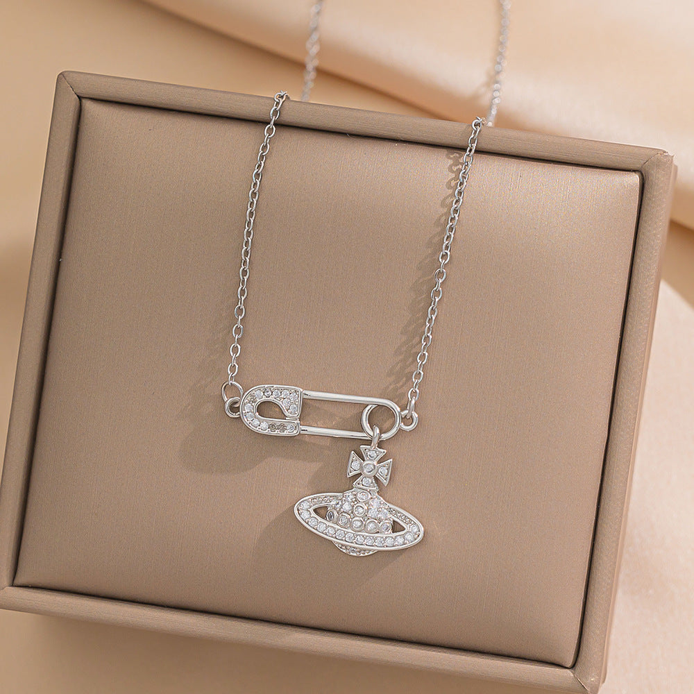 Minimalist Saturn Pendant Necklace for Women in Titanium Steel with Micro-Pave Rhinestone Inlay on O-Chain