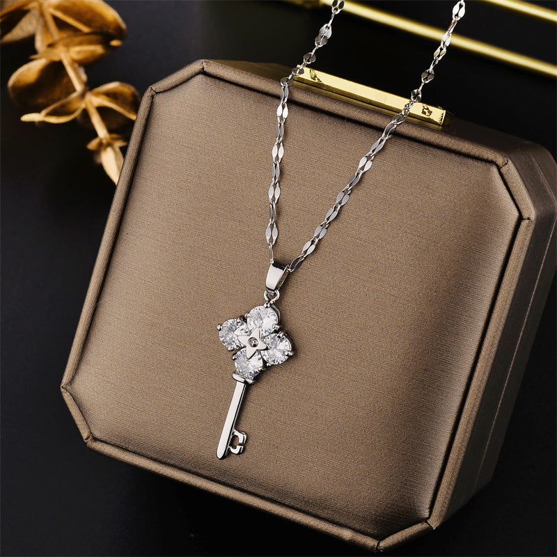 Geometric Key Pendant Necklace for Women in Titanium Steel with Gold Plating and Fringe Detail