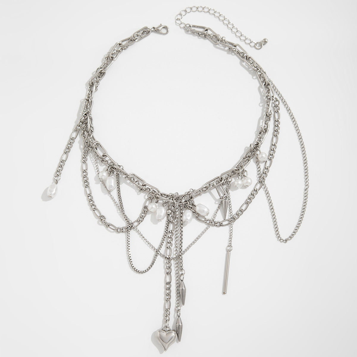 Sweet and Edgy Heart-Shaped Rivet Pendant Necklace for Women with Alloy and Stainless Steel, Electroplated Finish, Tassel Detail, Box Chain