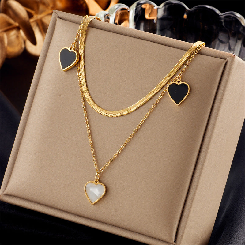 Collana da Donna Minimalista alla Moda in Acciaio Inossidabile con Ciondolo a Stella e Cuore Irregolare Multistrato