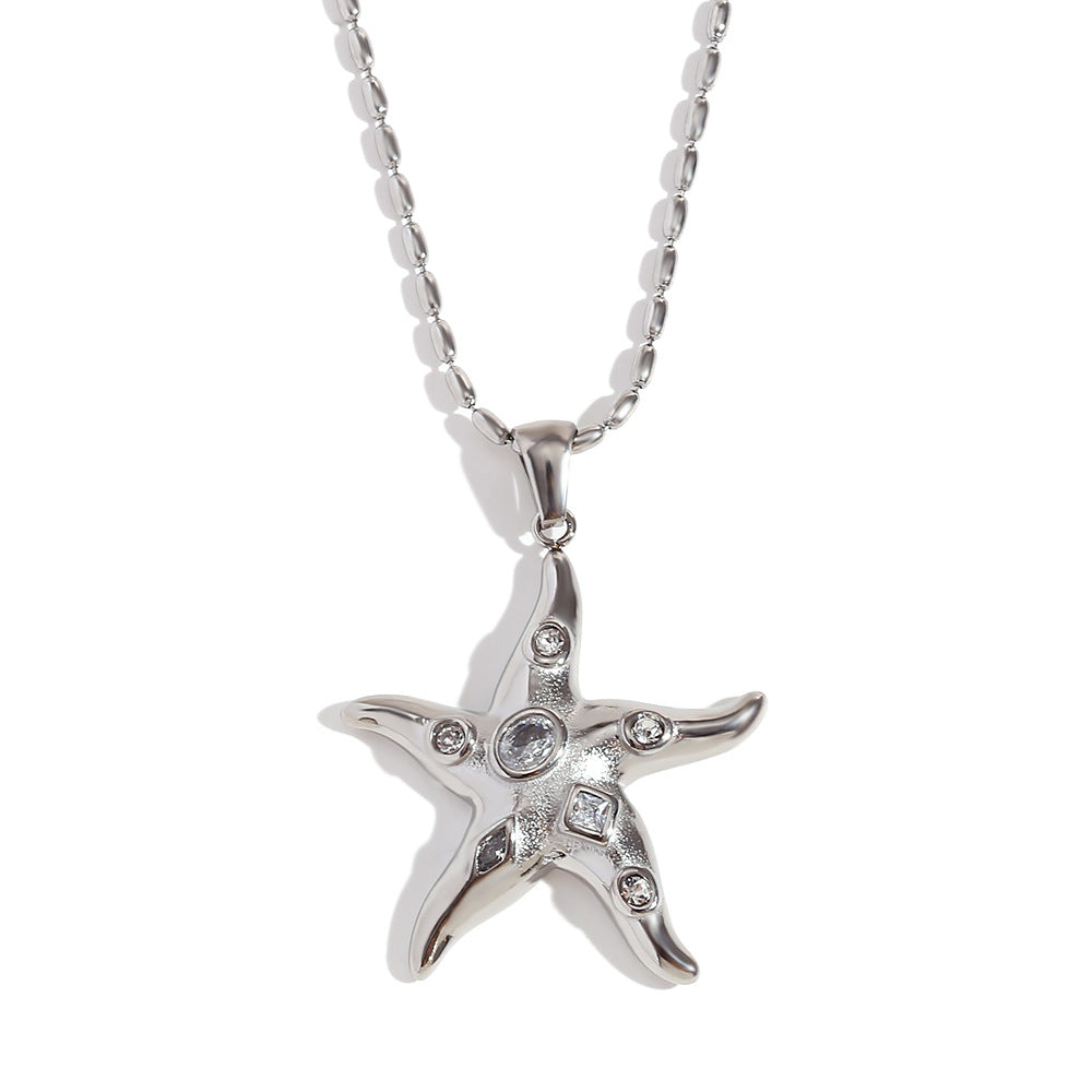 Collar con colgante de estrella de mar geométrica para mujer en acero inoxidable con baño de oro de 18K e incrustaciones de circonitas