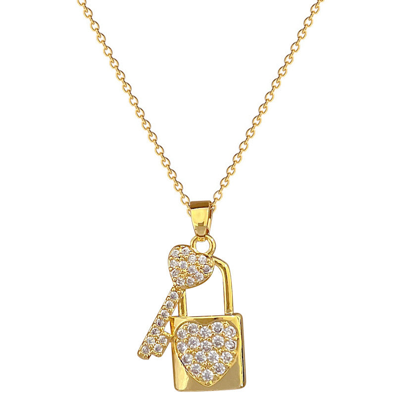 Collana di lusso in acciaio al titanio con ciondolo a cuore geometrico e strass