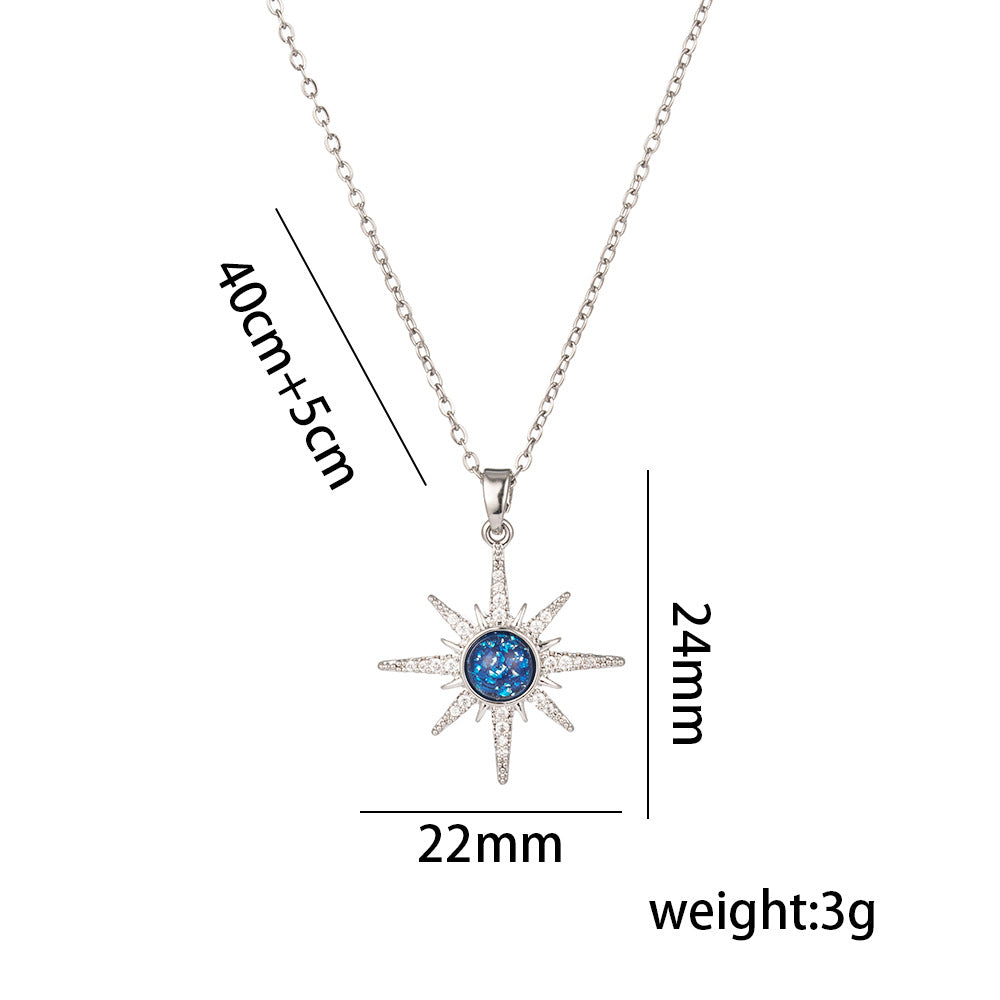 Collana con Ciondolo a Stella e Pianeta Geometrico di Lusso da Donna con Intarsio di Zirconi su Catena a O in Acciaio al Titanio