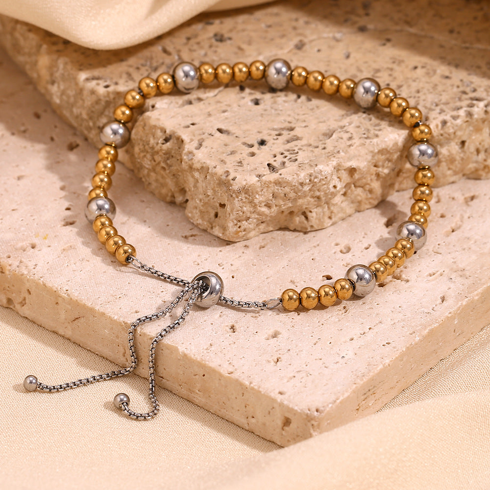Elegante bracciale geometrico minimalista in acciaio inossidabile con placcatura in oro 18 carati e design regolabile con perline per donna