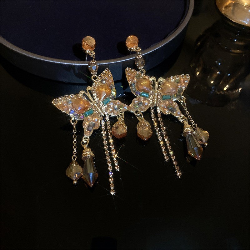 Elegantes pendientes de perlas y circonitas con forma ovalada y lazo en acero inoxidable para mujer