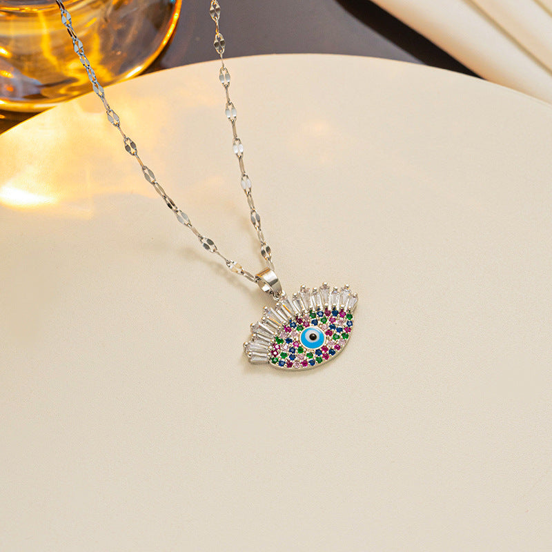Fashionable Evil Eye Pendant Necklace for Women in Titanium Steel with Rhinestone Inlay and 18K Gold Plating on Wavy Chain