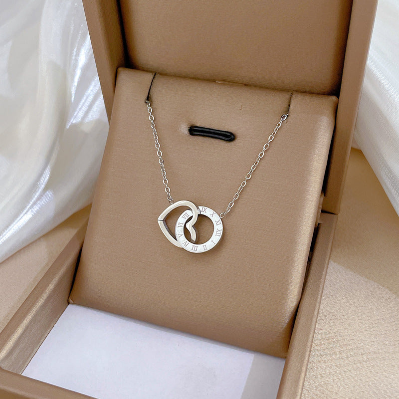 Collar minimalista chapado en acero de titanio con forma de corazón para mujer con colgante geométrico y delicada cadena de clavícula