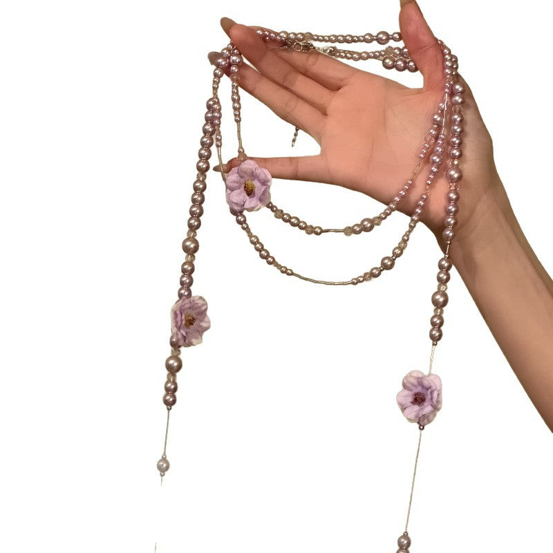 Elegante collar de perlas florales para mujer con acabado galvanizado, cadena de suéter de estilo vintage dulce, joyería colgante de lujo ligero