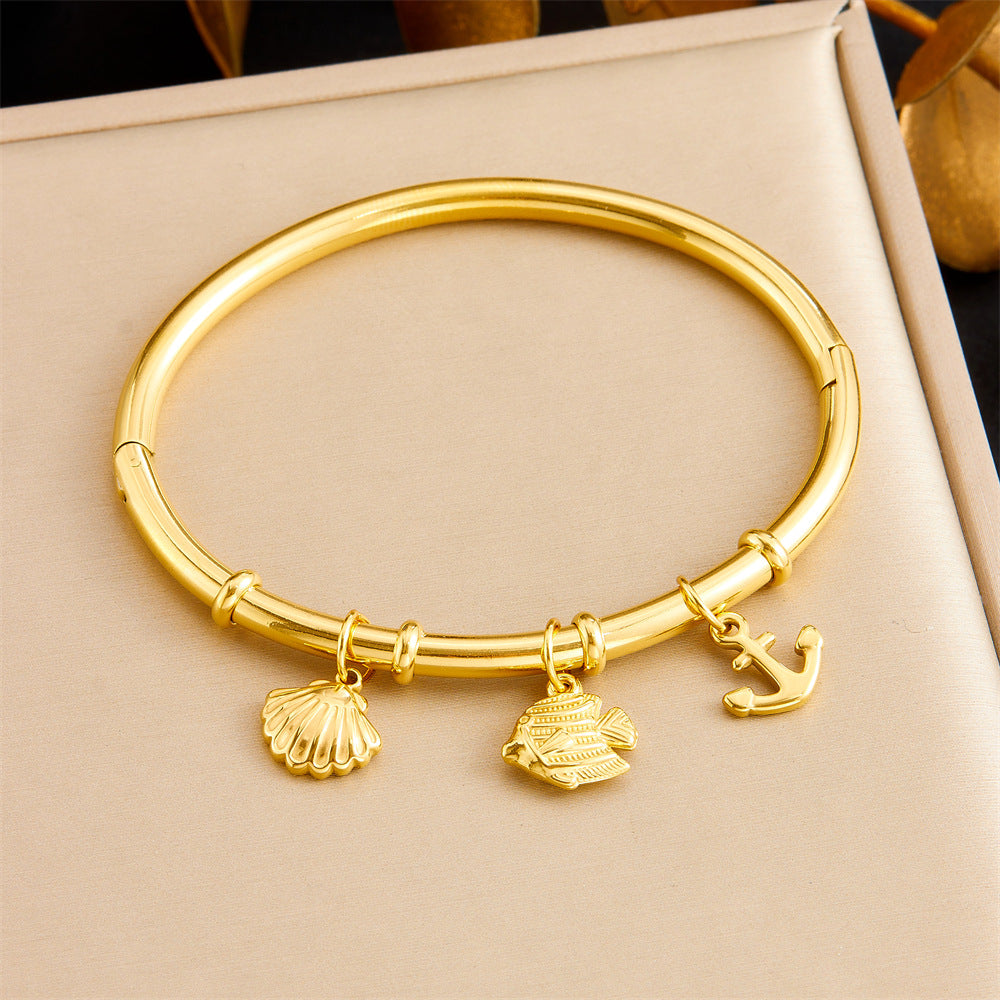 Bracciale Minimalista in Acciaio Inossidabile Placcato Oro a Tema Oceano Tropicale con Motivi di Stella Marina, Conchiglia e Farfalla