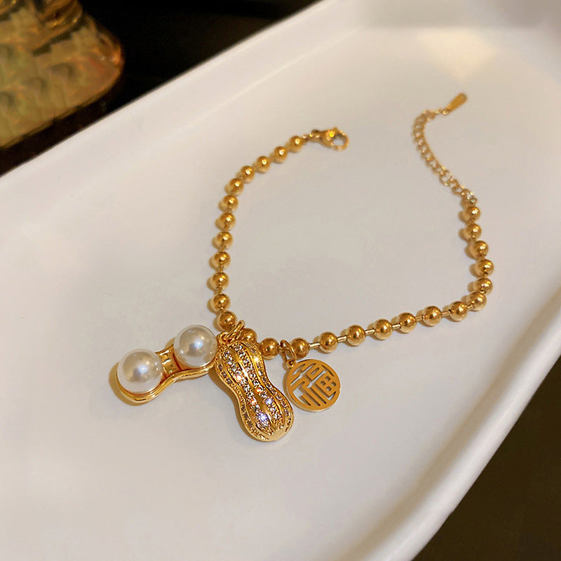 Bracciale da donna in acciaio al titanio placcato, stile cinese, con perline geometriche a forma di arachide