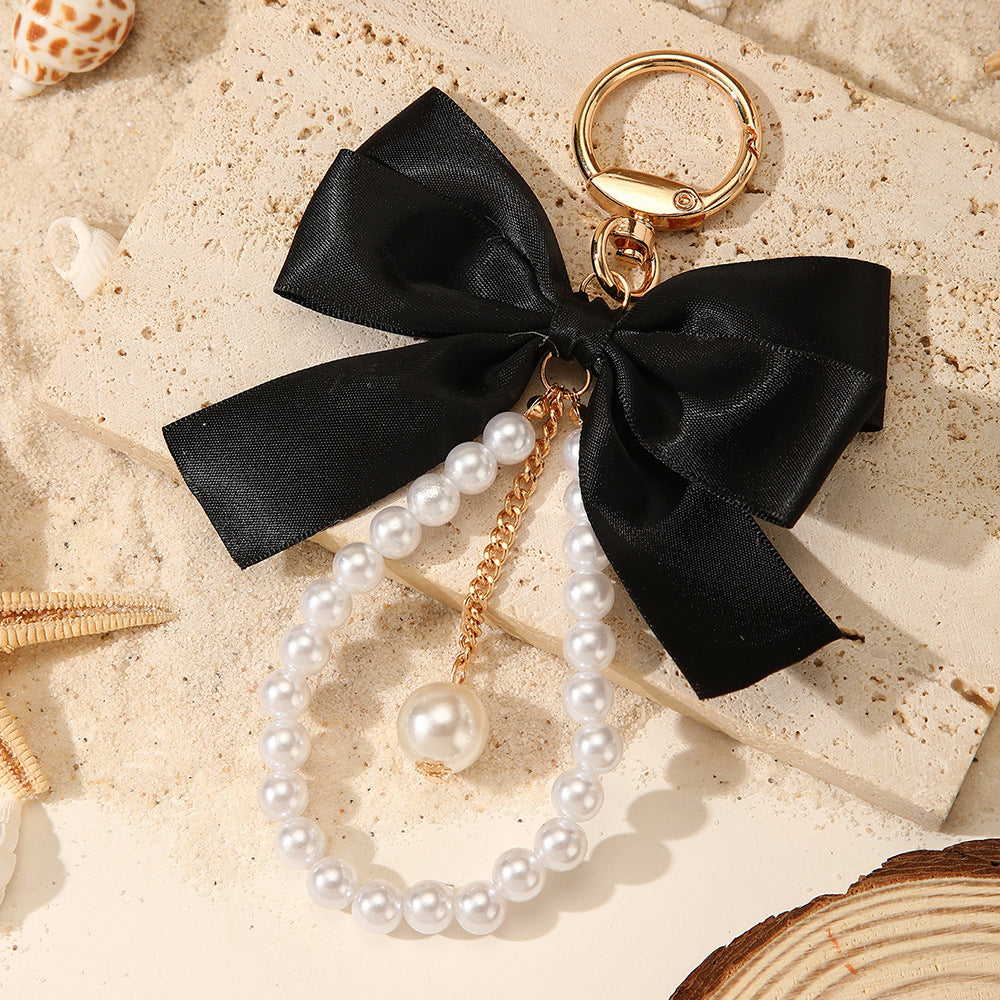 Sweet Cartoon Bow Pearl Zinc Alloy Keychain Bag Charm