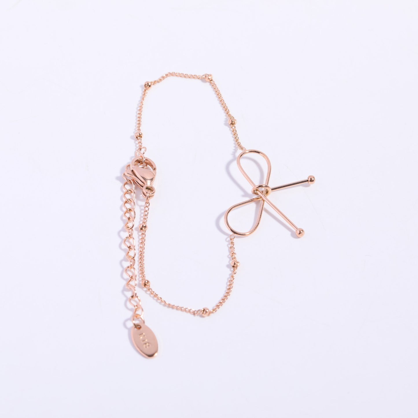 Parure Collana e Bracciale da Donna con Fiocco in Acciaio al Titanio Placcato Oro 18K