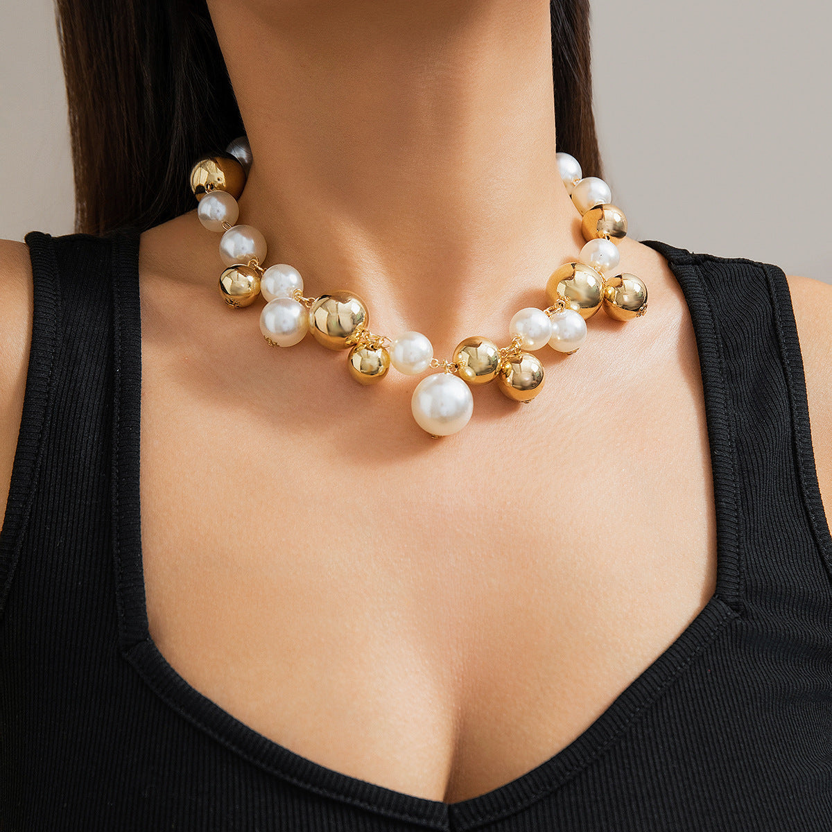 Minimalist Geometric Pendant Necklace for Women with Imitation Pearl Drop and Electroplated Metal Ball Tassels on Beaded Chain