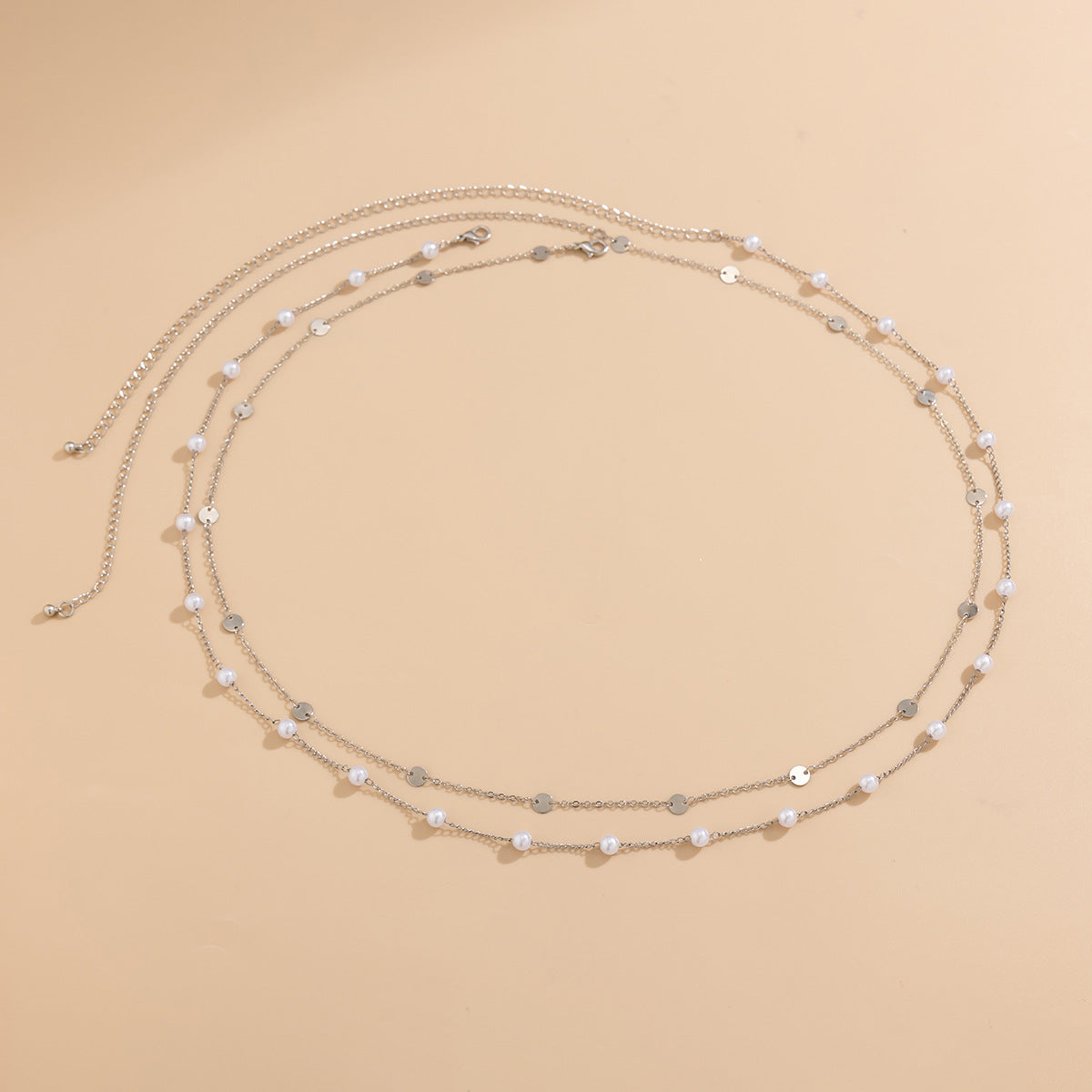 Cadena corporal doble para mujer de estilo minimalista frío-neutro con diseño de cadena de serpiente y cierre de langosta en metal