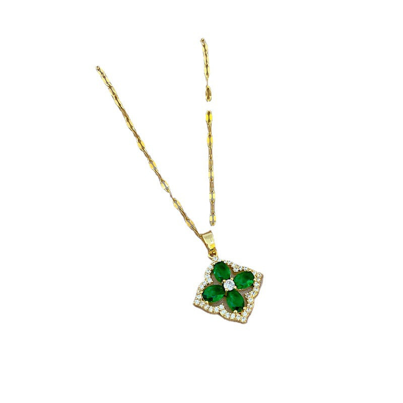 Luxury Titanium Steel Micro-Paved Zircon Four-Leaf Clover Necklace for Women with Gold-Plated Copper Pendant and Adjustable Chain