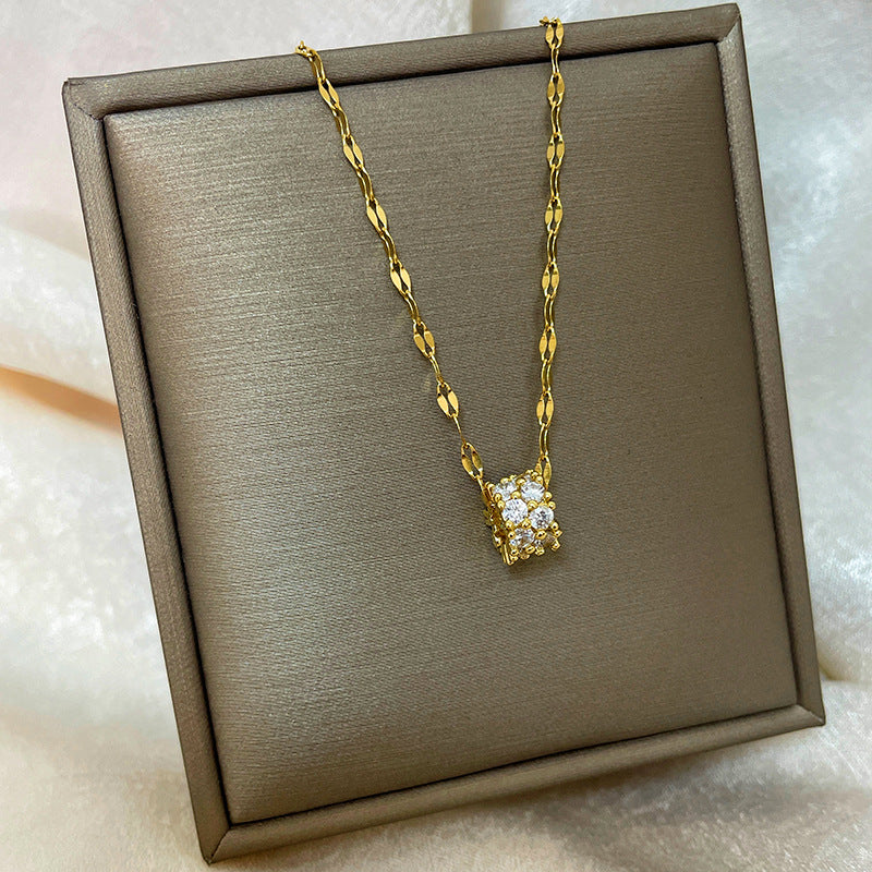 Collana con ciondolo a goccia in rame placcato oro 18 carati con micro-pavé e catena a onda in acciaio al titanio, design originale