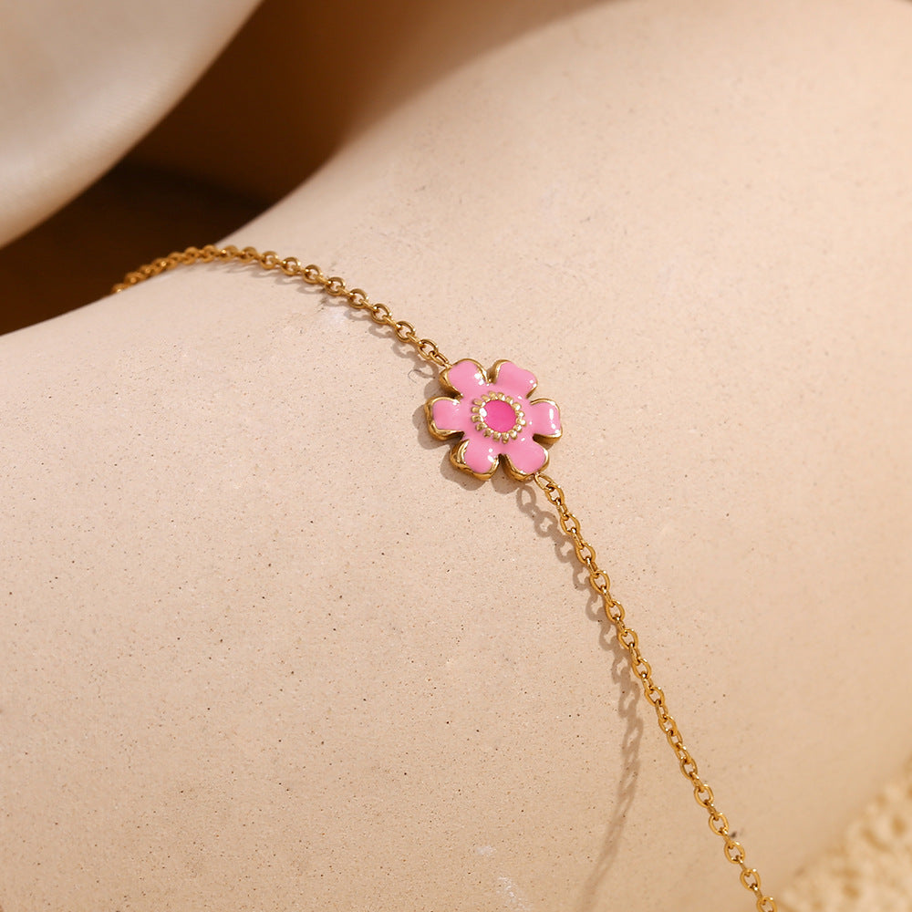 Bracciale da donna in acciaio inossidabile placcato oro 18K con smalto a forma di petalo di fiore alla moda