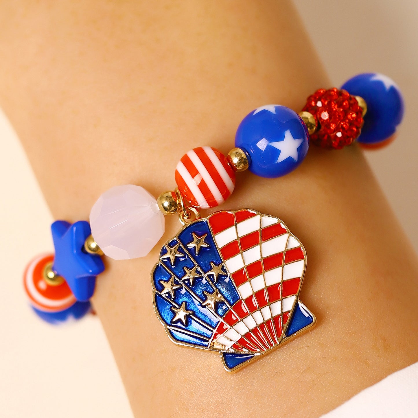 Juego de pulsera y pendientes de aleación de zinc chapados con diseño de estrellas de la bandera estadounidense para mujer