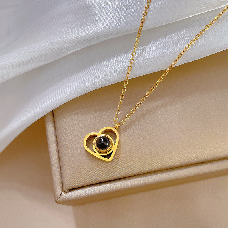 Minimalist Heart-Shaped Titanium Steel Necklace with Gold Plating for Women and Men, Pendant Projection Design, Fashionable Clavicle Chain