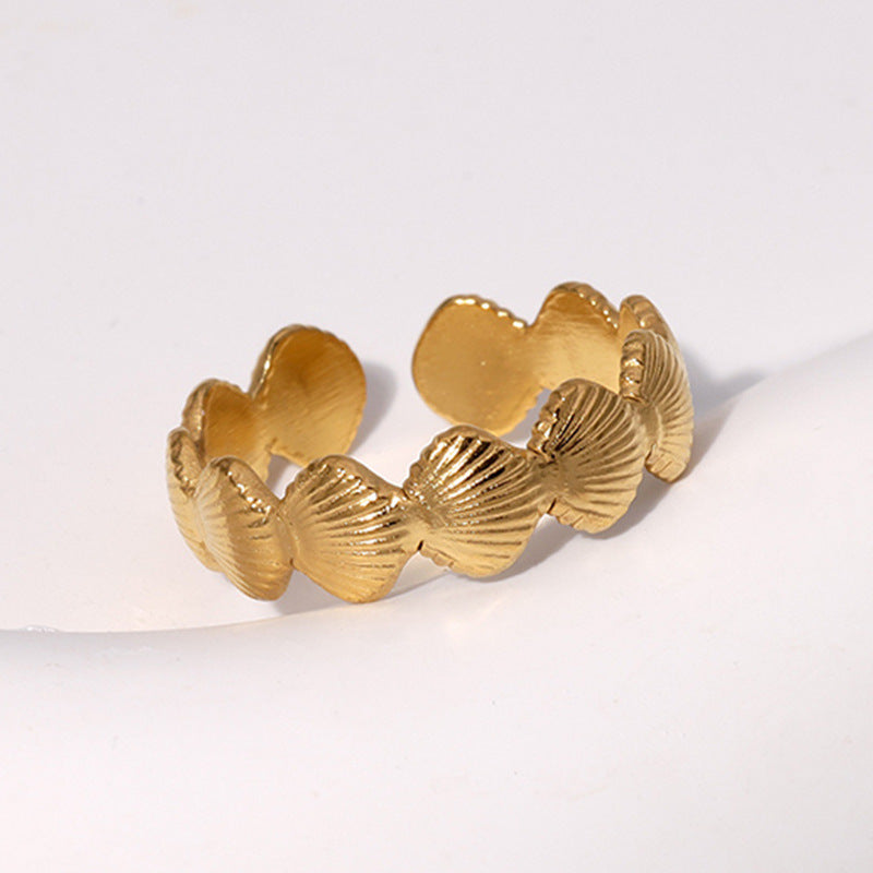 Anello da donna in titanio e acciaio intarsiato a conchiglia, regolabile e minimalista