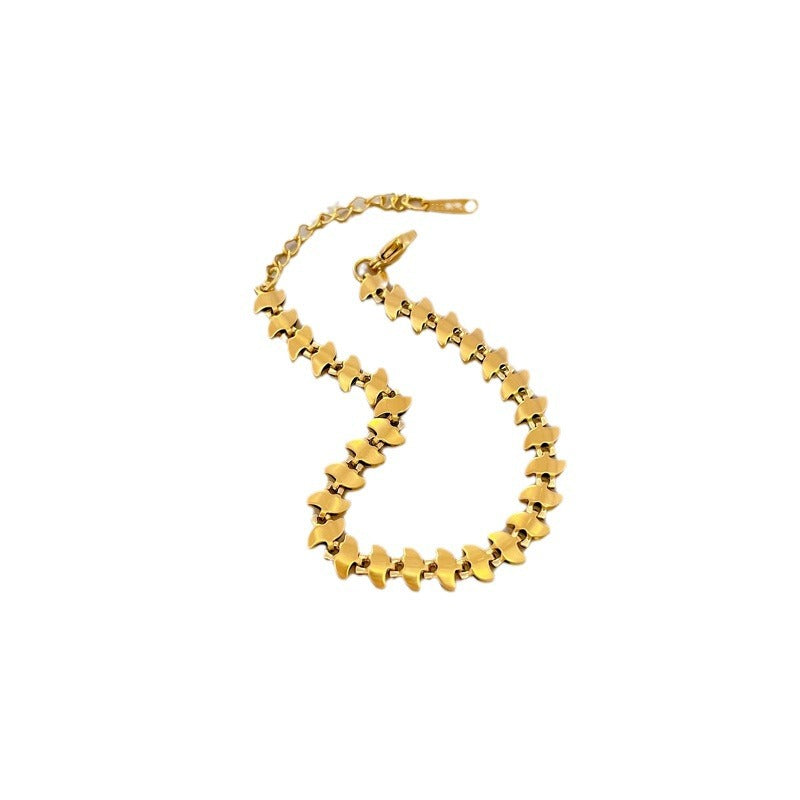 Minimalist Dart-Shaped Titanium Steel Bracelet for Women with Gold Plating and Wavy Texture