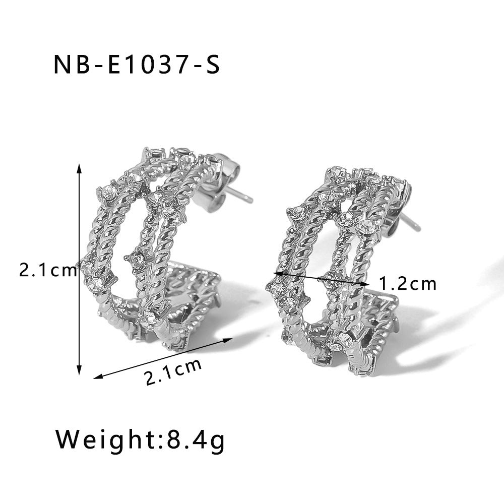 Orecchini geometrici in acciaio inossidabile con intarsio di zirconi e placcatura sottovuoto in oro per donna