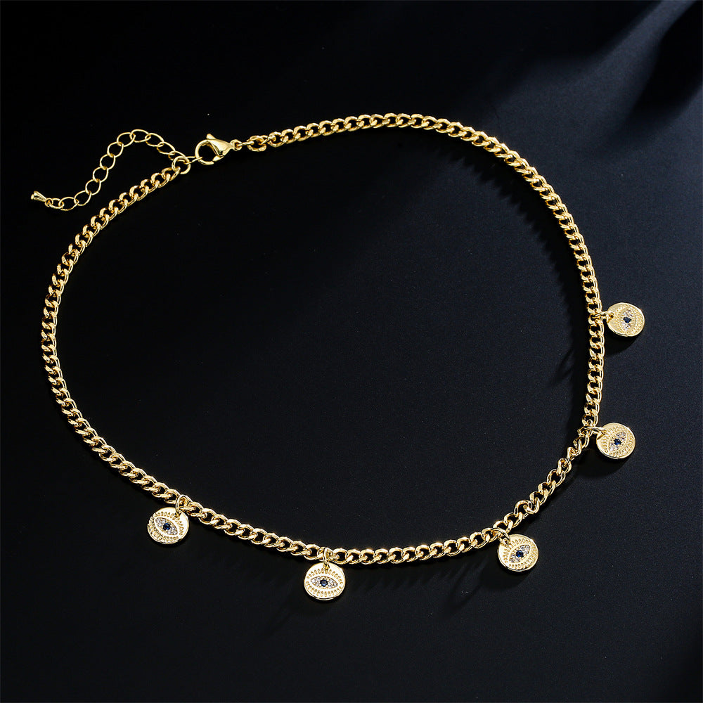 Collana con ciondolo geometrico in rame con placcatura in vero oro e intarsio di zirconi