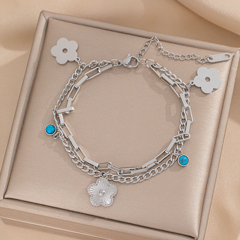 Bracciale da donna in acciaio al titanio con fiore a cinque petali geometrico minimalista, placcatura in oro 18 carati e finitura ipoallergenica