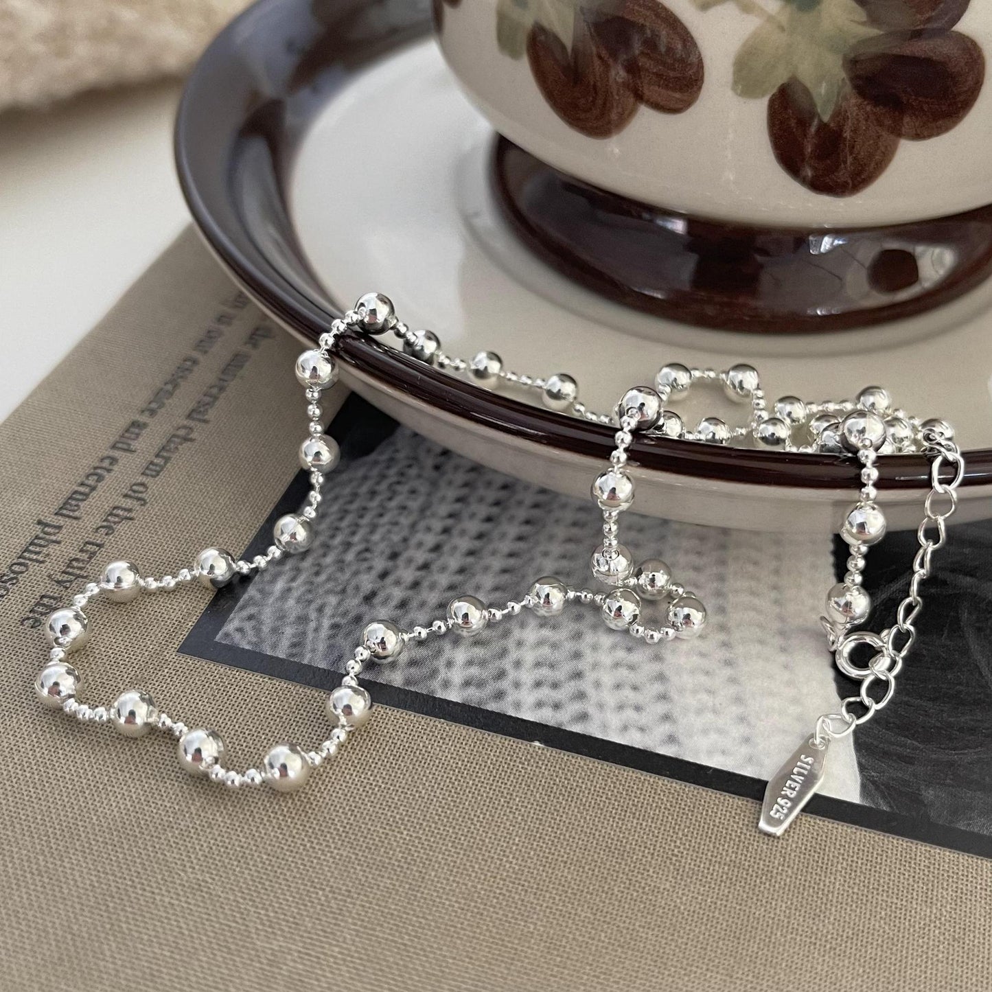 Minimalist Round Bead Necklace in 925 Sterling Silver with Gold Plating, Geometric and Doll-Inspired Pendant Design
