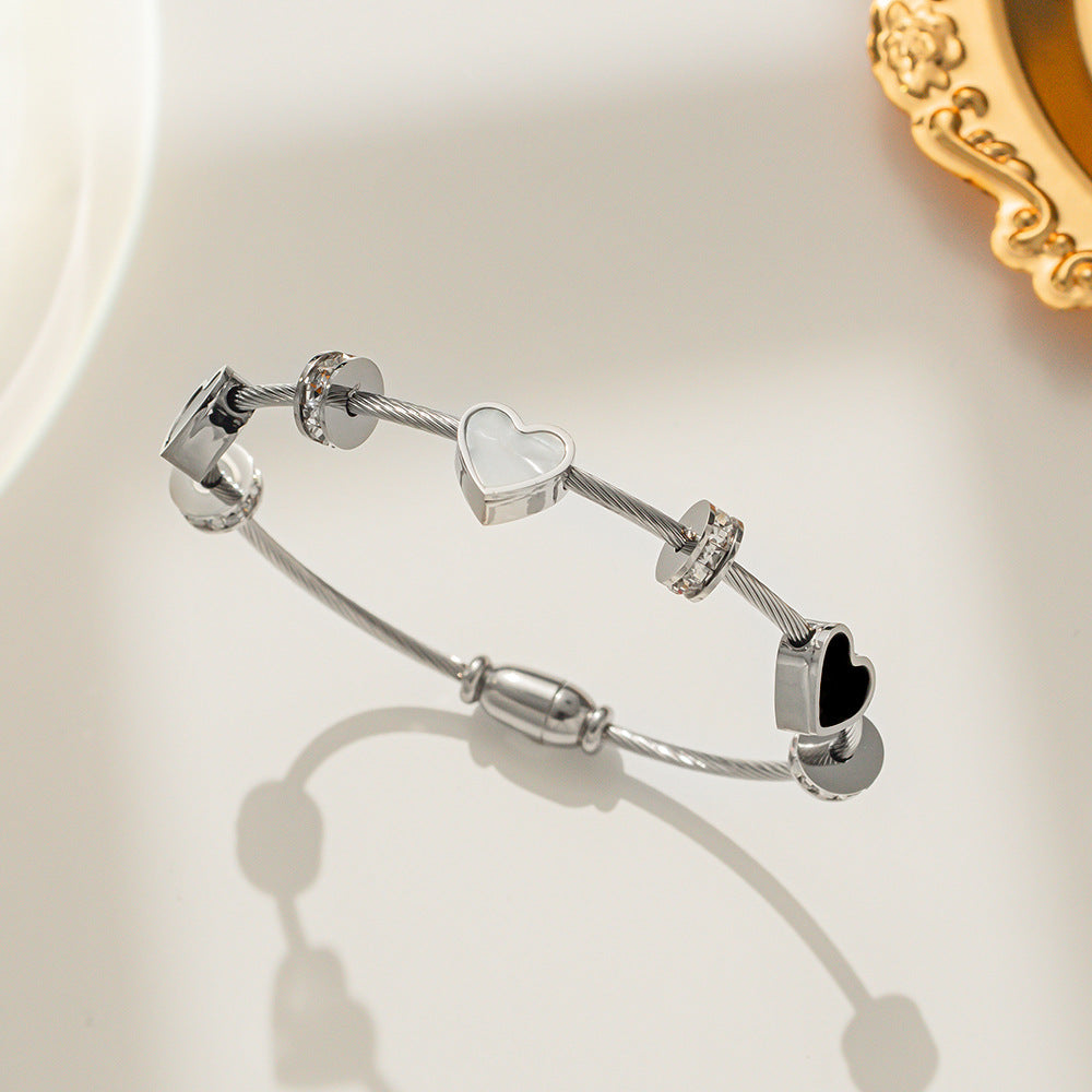 Minimalist Double Heart Titanium Steel Bracelet for Women with Micro-Paved Zirconia and Gold Plating
