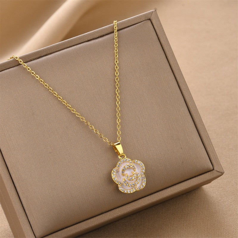 Elegant Camellia-Shaped Pendant Necklace in Titanium Steel with Gold Plating and Zircon Accents for Women