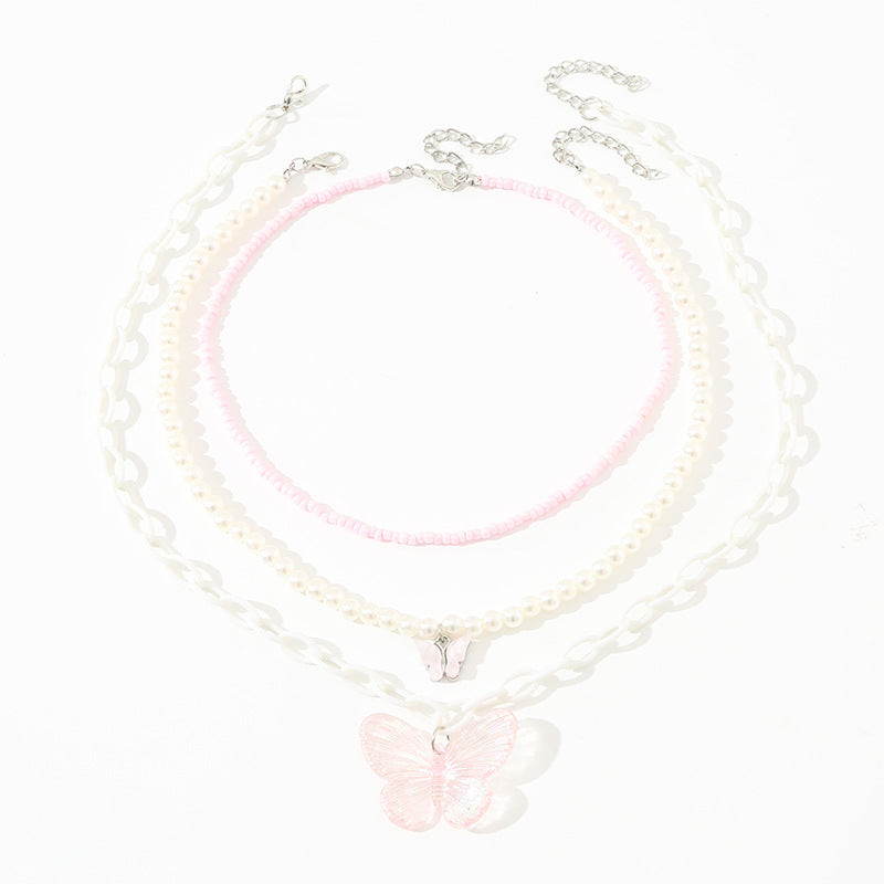 Set collana con ciondolo a farfalla rosa per bambine con ciondolo in resina e catena di perle in stile principessa per primavera ed estate