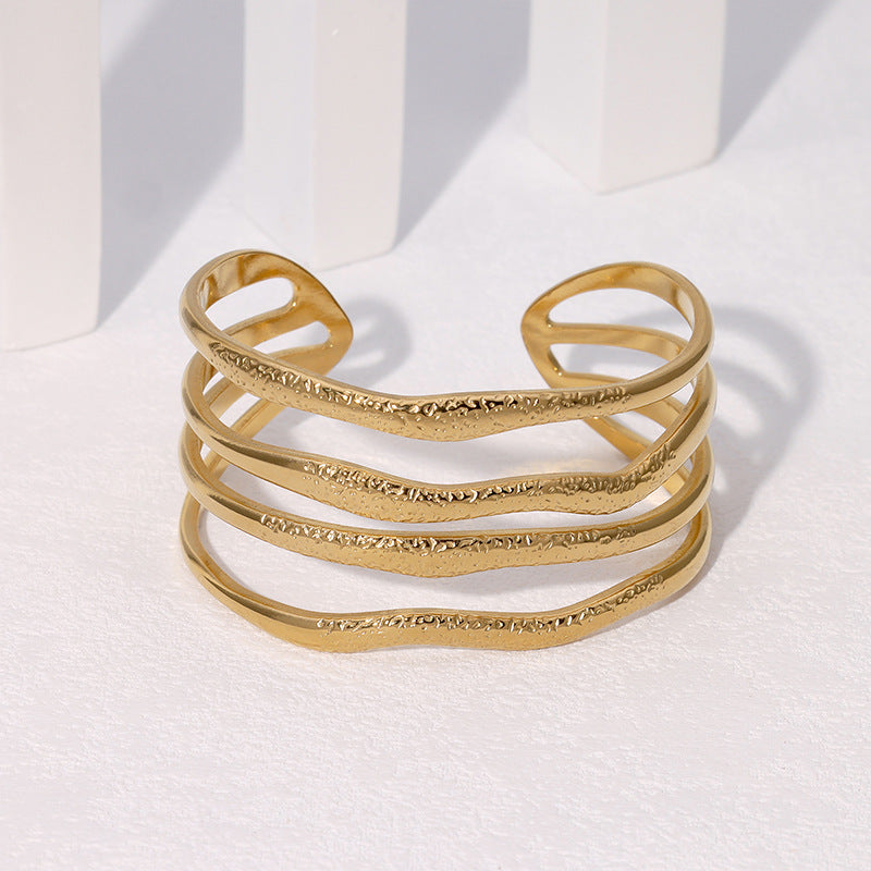 Bracciale rigido da donna in acciaio inossidabile, con design geometrico irregolare, placcato oro, stile minimalista di lusso