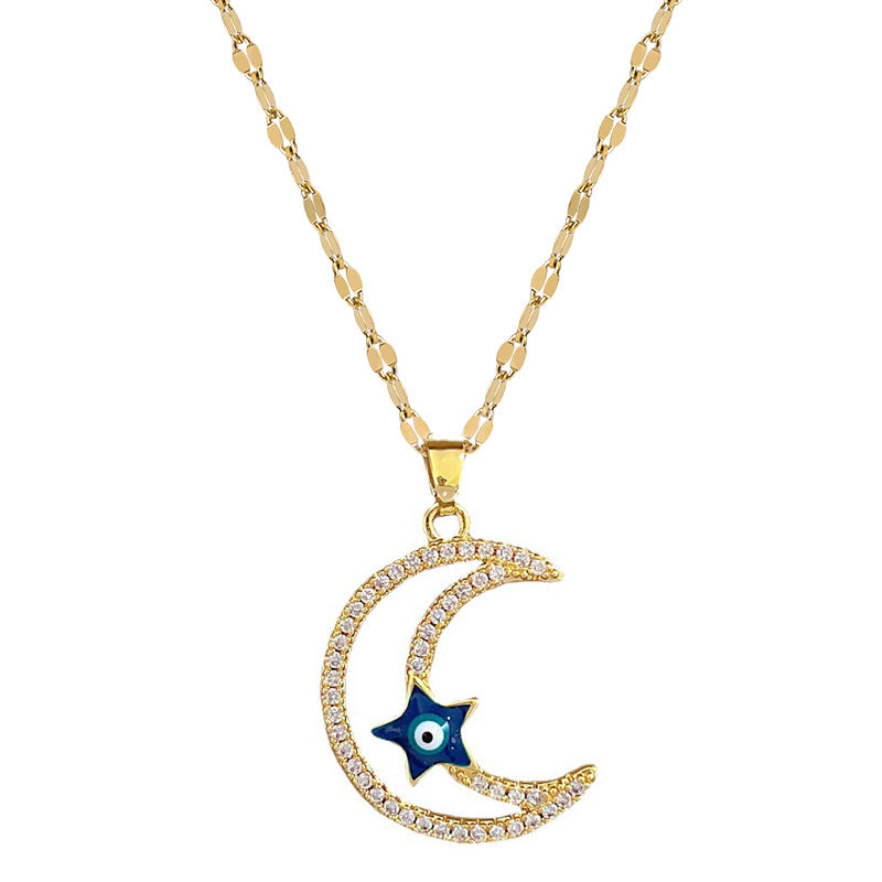 Collana con pendente minimalista a stella e luna da donna in acciaio al titanio con intarsio di strass e finitura placcata