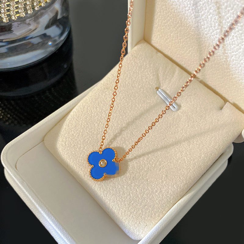 Blue Four-Leaf Clover Titanium Steel Necklace with 18K Gold Plated Double-Sided Black and White Pendant