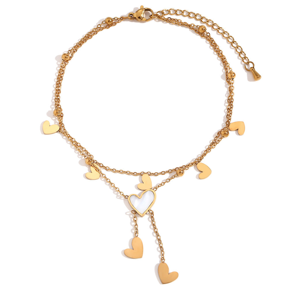 Tobillera Minimalista de Doble Capa con Cadena de Acero Inoxidable, Cuentas Espaciadoras en Forma de Corazón Bañadas en Oro de 18K, Abalone Blanco y Detalles de Borla