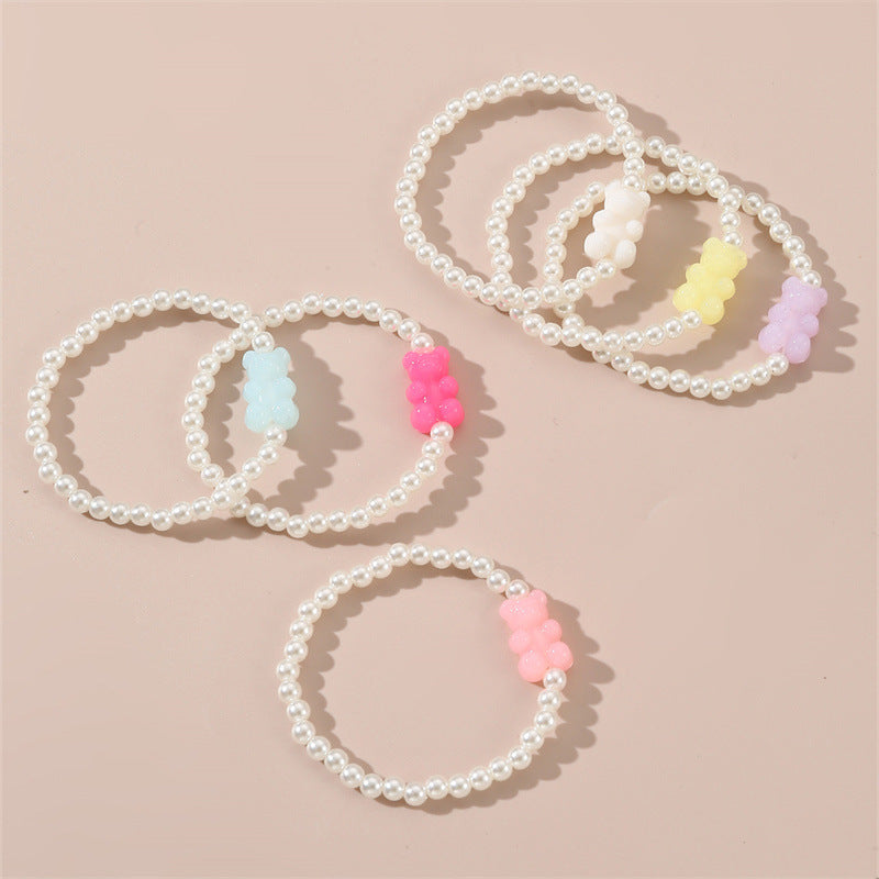 Braccialetto per bambini con ciondolo a orsetto in resina minimalista, design con perline fatte a mano e estetica fresca