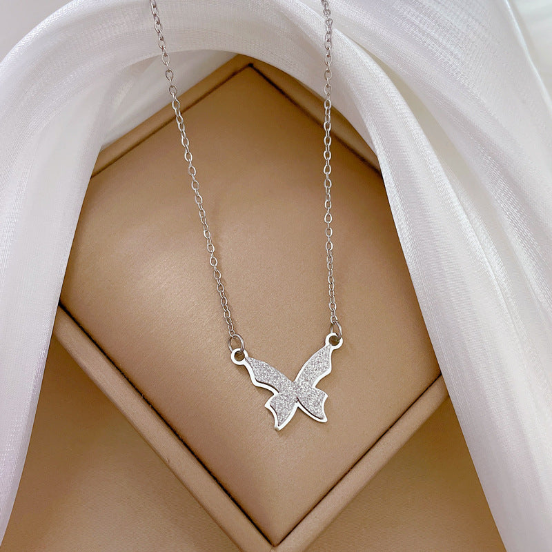 Minimalist Matte Titanium Steel Butterfly Pendant Necklace for Women with Gold Plating and Geometric Edge Bead Detail