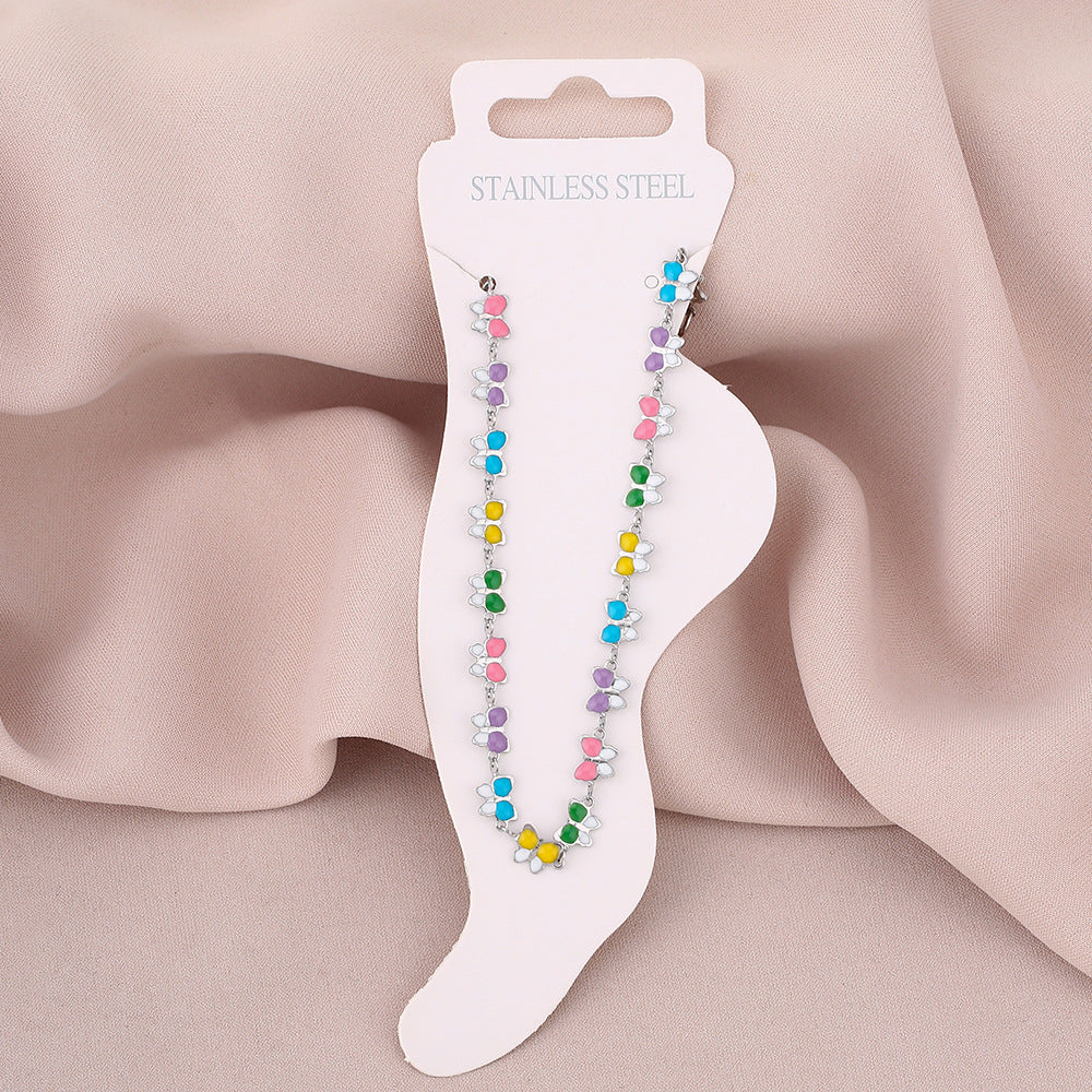 Elegante cavigliera da donna in acciaio al titanio a forma di farfalla con smalto, accessorio di moda dal design geometrico