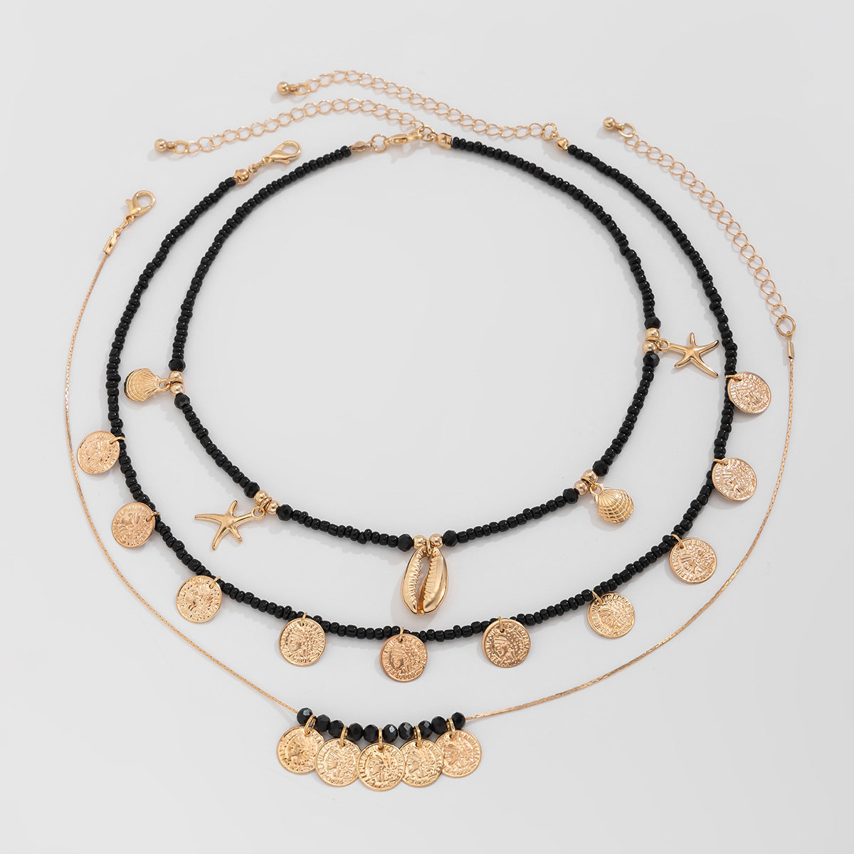 Collana con ciondolo a moneta in stile bohémien vintage in lega placcata su catena di perline da donna
