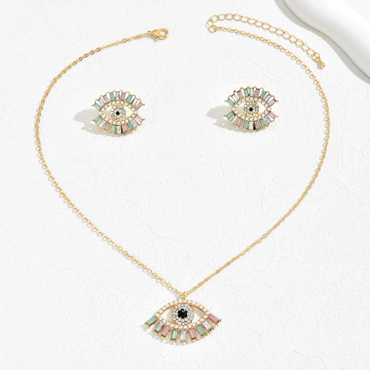 Juego de collar con colgante de ojo de ángel de estilo hip hop minimalista y pendientes de tuerca para mujer, aleación con incrustaciones de diamantes de imitación
