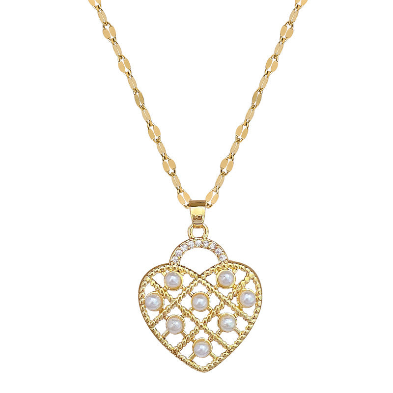 Collar con colgante de corazón hueco minimalista para mujer y hombre con detalles de perlas e incrustaciones de diamantes de imitación en cadena de acero inoxidable