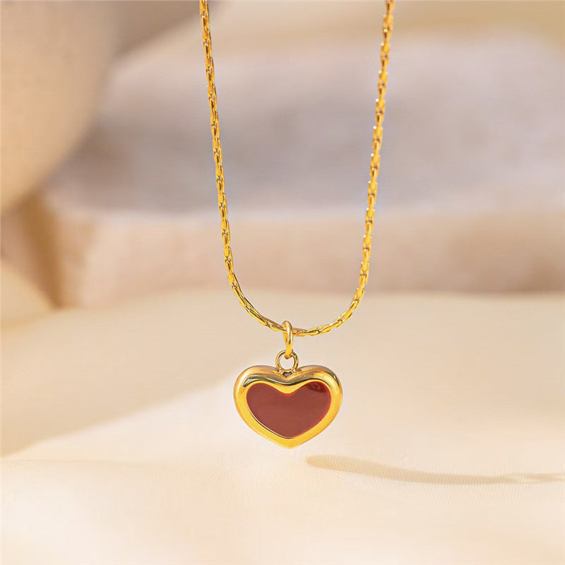 Set di collana minimalista in acciaio al titanio a forma di cuore con smalto, catena a serpente e orecchini a perno.